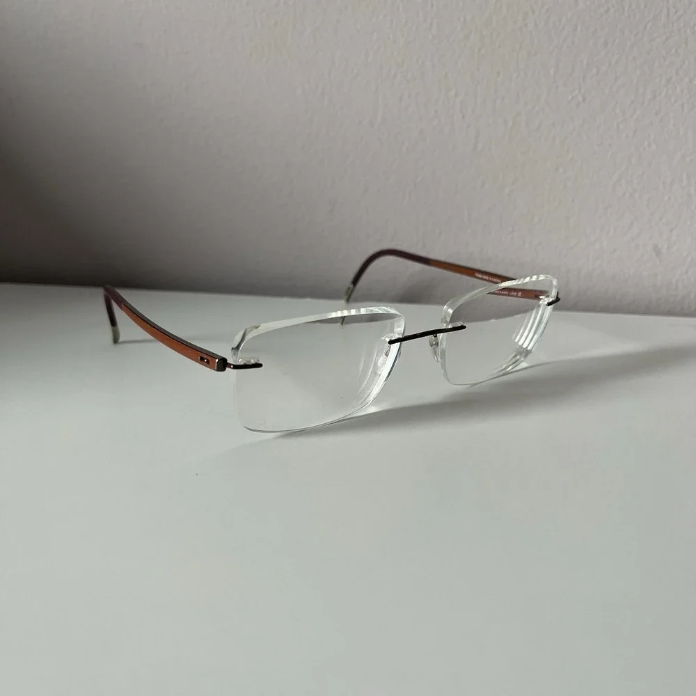 Silhouette Rimless Titanium SPX Frames 7642 40 6055 Brown Burgundy 17x135